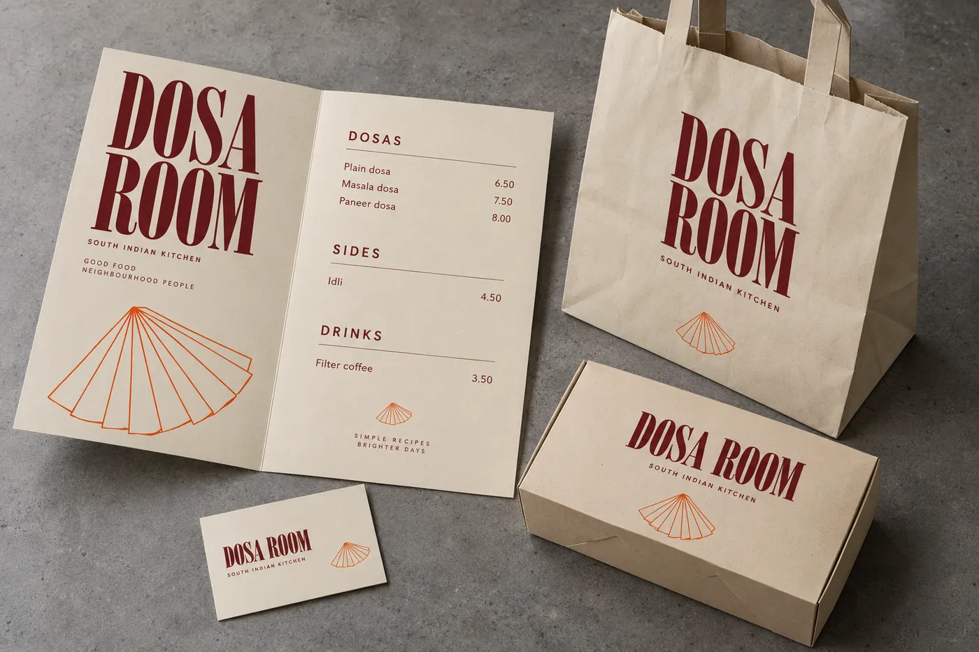 Dosa Room restaurant identity: folded menu, takeaway bag, delivery box and business card, all sharing one typographic system